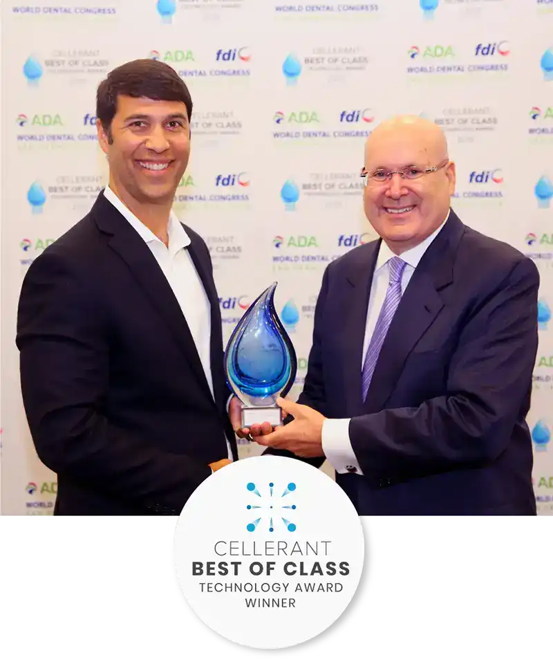 Ian McNickle accepting the Best of Class award in technology 2019 with Lou Shuman, DDS