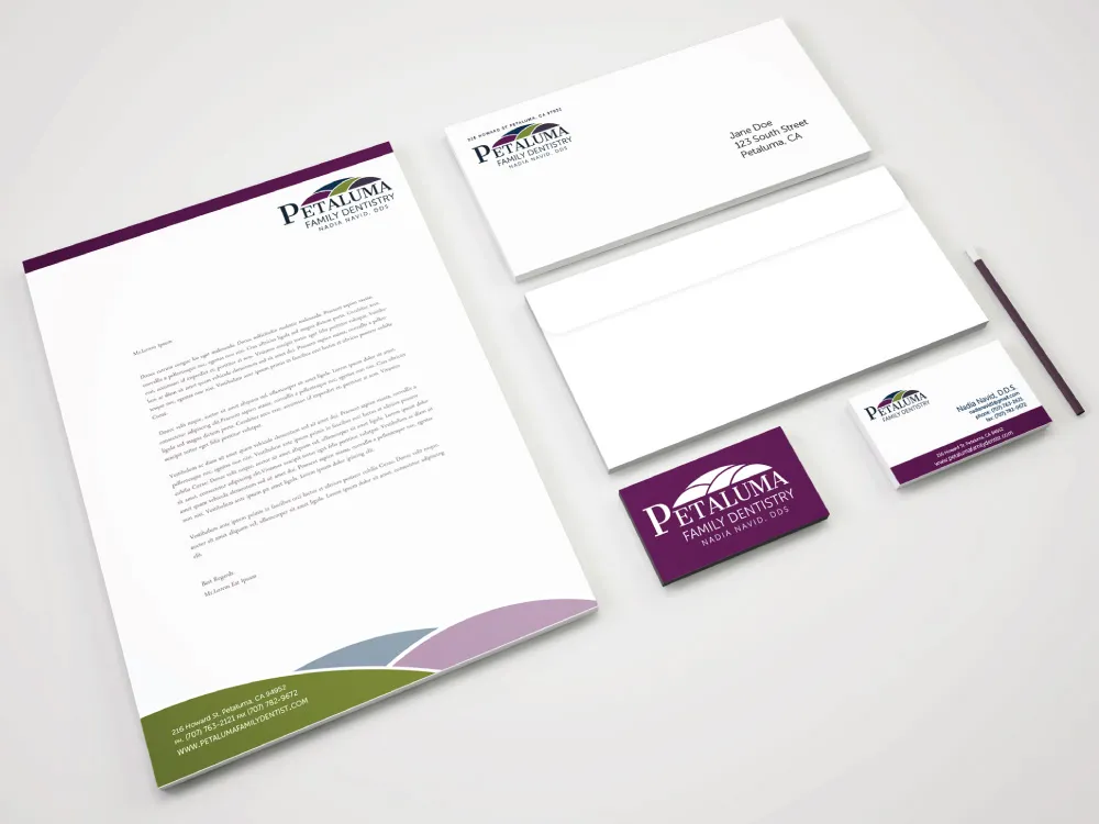 WEO Media Logo purple, green, and white letterhead and businesscard print design