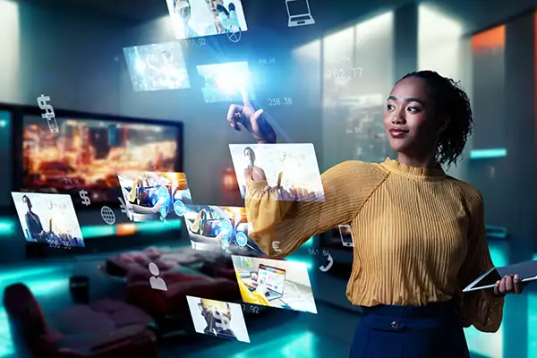 Woman browsing several digital screens Woman browsing several digital screens