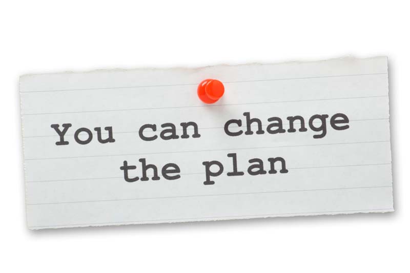 A post-it note with the text 'You Can Change the Plan'